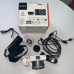 White Sony Alpha a6000 Mirrorless Digital Camera 24.3MP SLR Camera with 3.0-Inch  LCD w/16-50mm Power Zoom Lens for Sale in Long Beach, CA - OfferUp