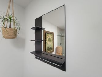Large bathroom mirror featuring a lower metal bar with integrated side shelves from IKEA's Lillången series. M: 30.5" x 23.5" x 4.5".