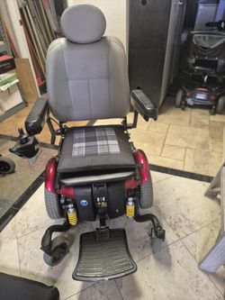 Pride Mobility assisted wheel chair