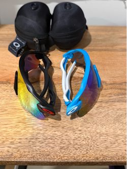 2 Pairs of Oakleys