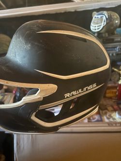 Black and white Rawlings helmet
