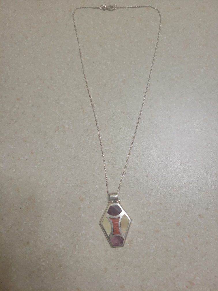 950 Silver Pendant With 950 Silver Necklace.  Weight Is 19.5 Grams