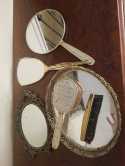 Vintage mirrors and brush