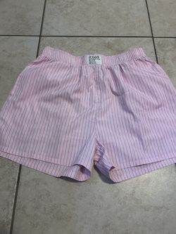 women’s pink and white striped shorts