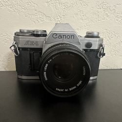Canon AE-1 35mm Film Camera w/Canon FD 50mm 1:1.8 Lens