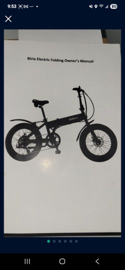 Biria E2 Electric Matt Black Folding Fat Tire Bike with fenders rack.