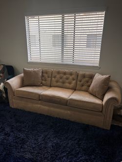 Tan Tufted Sofa with Nailhead Trim
