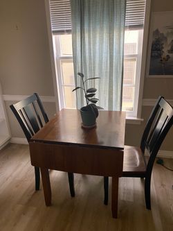 Drop leaf table with chairs