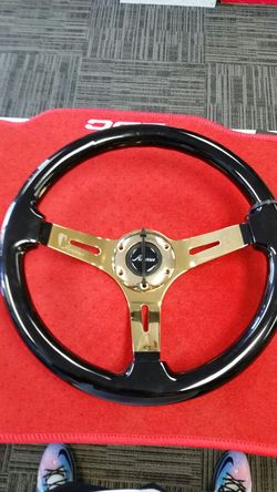 Brand new Black and Gold Avenue Steering Wheel