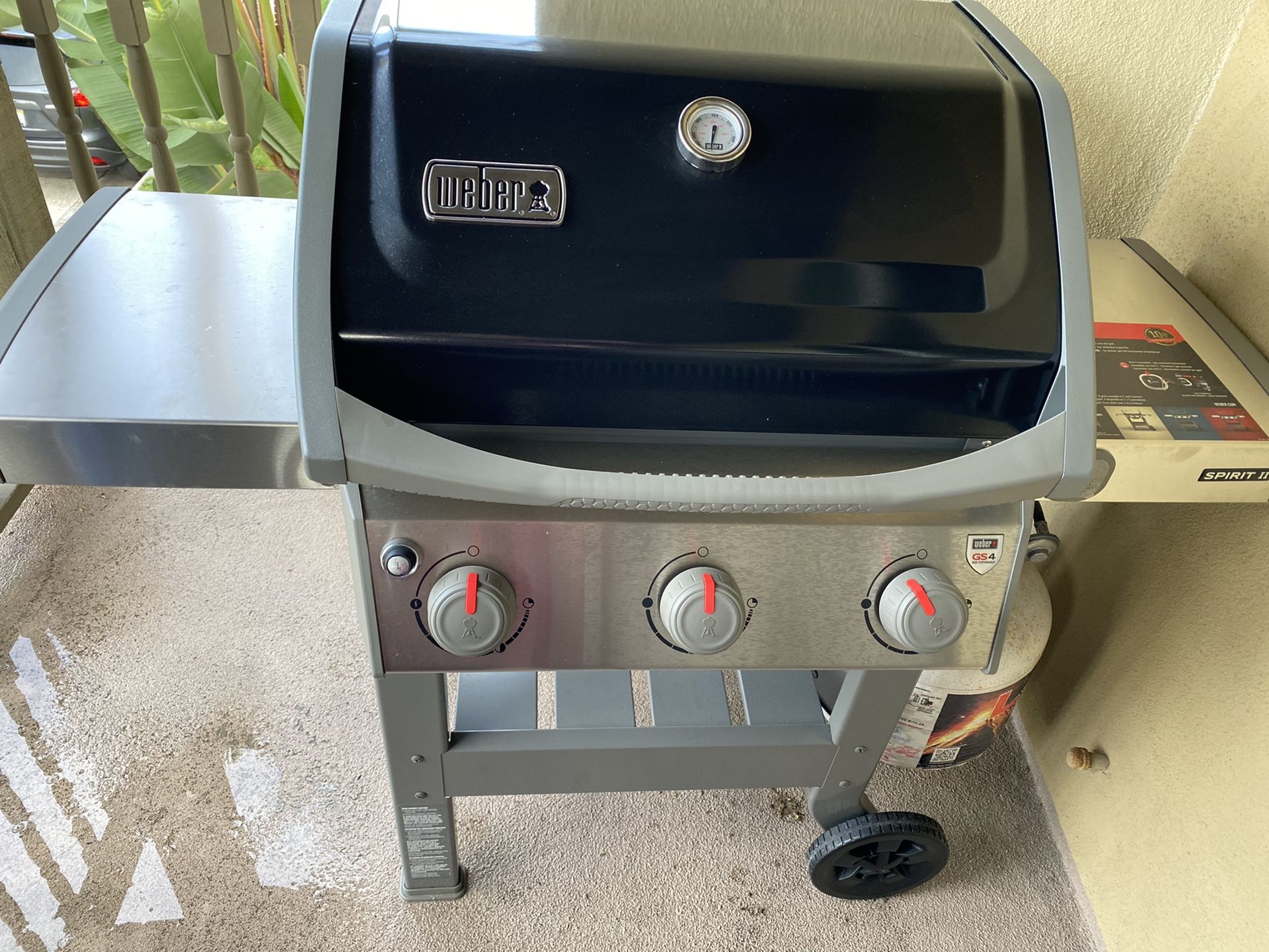 Weber propane grill spirit ii e 310 nee never used with cover and propane tank