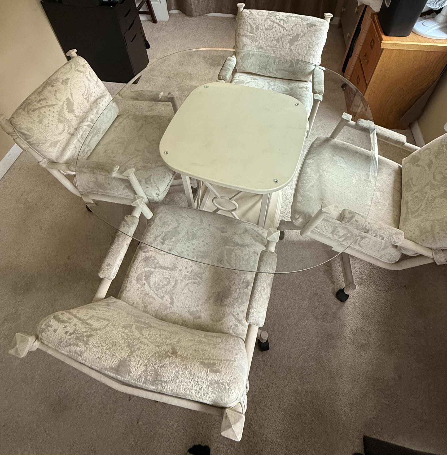 Glass Dining Room Table With Rolling Chairs