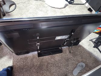 Large Flat Screen TV with Wall Mount Bracket