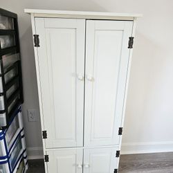 New, never used slim white 4 Shelve Cabinet