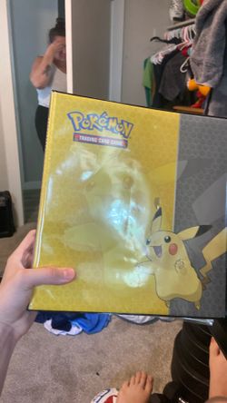 Pokemon binder with cards in it
