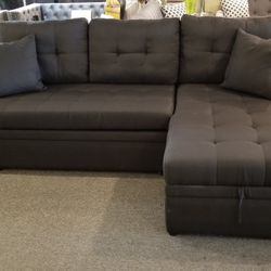 Brand New 86" x 61" Black Tufted Reversible Sectional With Pullout Sofa And Storage Chaise