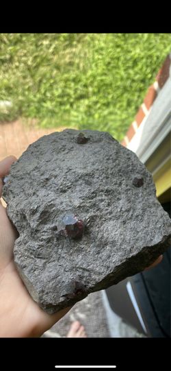 Raw garnet in stone