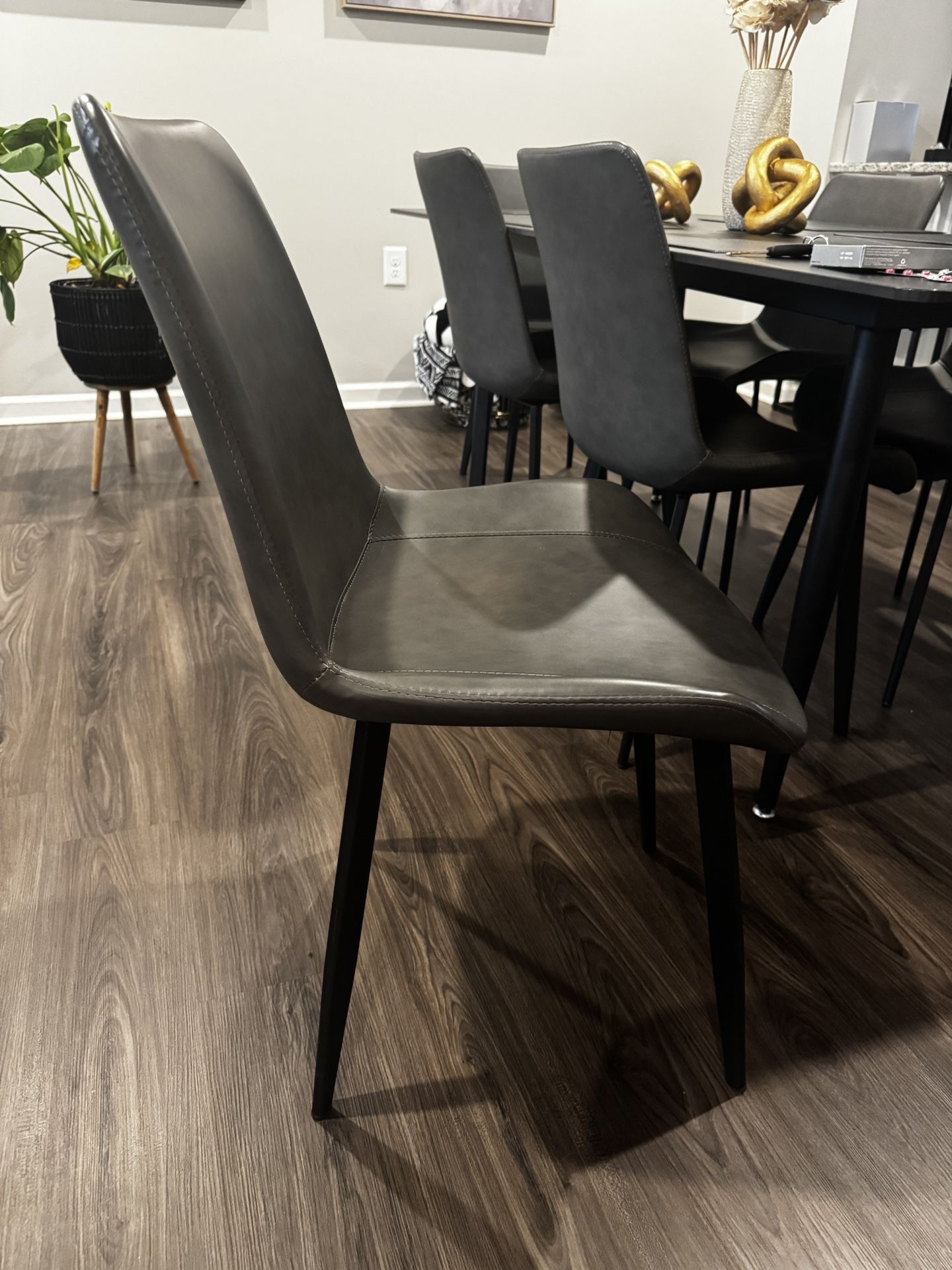 4 Brand New Gray Faux Leather Chairs