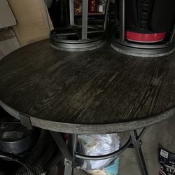 Tall Table With 7 Swivel Stools