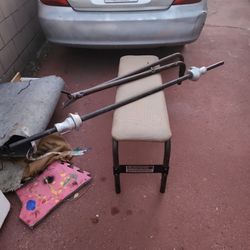 Weight Bench With Weights, Holder Bars, And The Locking Weight Poll.