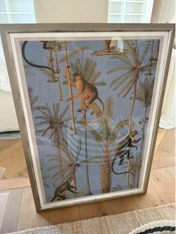 Monkey In Palm Tree Framed Print