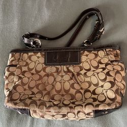 Brown Coach Purse And Black Wallet