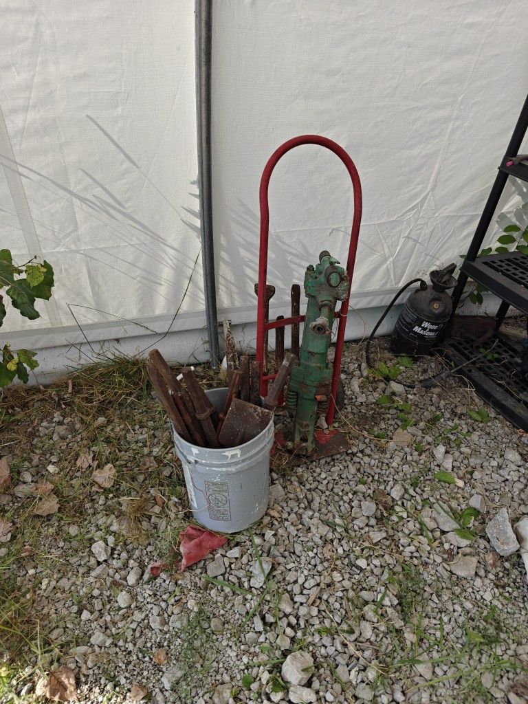 60 Lb Jackhammer With Dolly And Multiple Bits.  Uses Compressed Air. 
