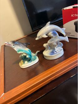 Dolphin figurines