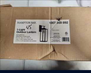 Hampton bay Maplebrook Outdoor Wall Sconce Light Fixture In Black With Gold accented light bulb base