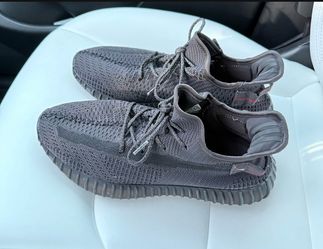Adidas Yeezy Boost 350 V2 in a Black with Red Accent Colorway