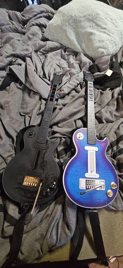 CRKD Gibson Controllers for PS3,PC,Switch selling 2 together with Guitar Hero warriors of rock and Metallica for ps3