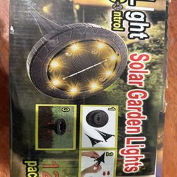 12-pack, solar-powered garden lights