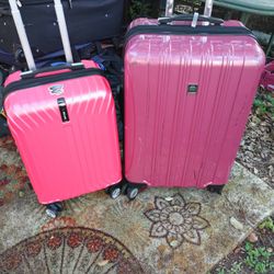 TWO NICE HARDSHELL PULL ALONG SUITCASE'S 