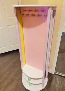Rotating Dress-Up Carousel / Storage Center