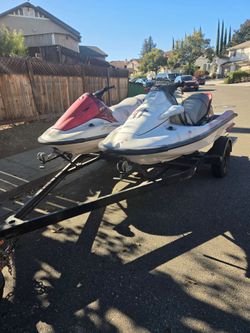 2 03 Kawasaki Jetskis with trailer