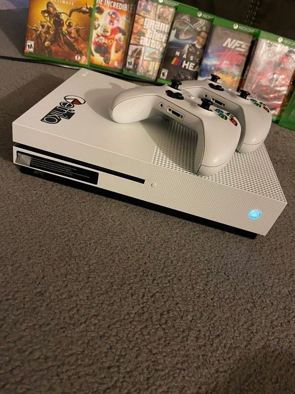xbox one s am giving it out to bless someone who first wish me happy wedding anniversary on my cellphone number now  707^340^9916