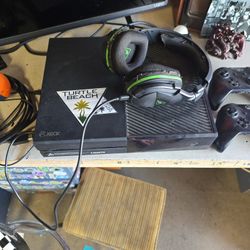 XBOX ONE CONSOLE WITH 2 CONTROLLERS. 2 AA Batteries are needed for each controller and Microsoft account