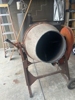 Cement mixer with folding handles