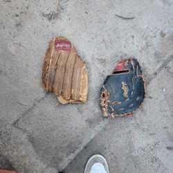 A Couple Of Good Shape Baseball Gloves 