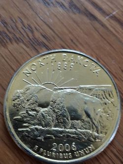2006 gold Quarter dollar