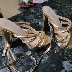 
Gold Strappy High Healed Shoes