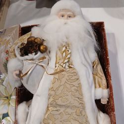Vintage Holiday Lane Opulence Santa with white faux-fur robes, which was a Macy's Exclusive tree topper. 