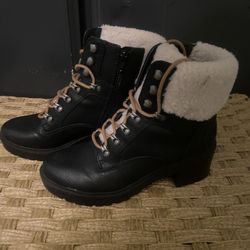 n Indigo Rd. Mallory faux fur black combat boot. 