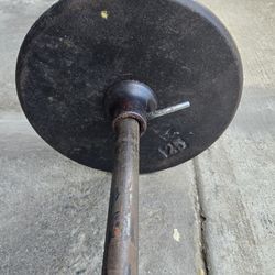 7 ft weight bar/2 25lb 1 inch weight plates/No longer use 