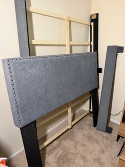 Gray Upholstered Headboard with Nailhead Trim