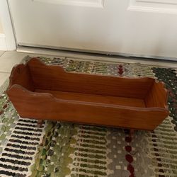 Handmade wooden doll cradle