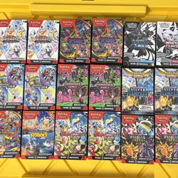 Pokémon Booster Bundles Prismatic Evolutions, Paldean Fates, Mega, Phantasmal, etc.