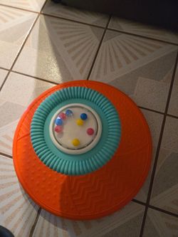 Spinning activity toy