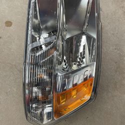 Headlight Driver side Original  RAM 
