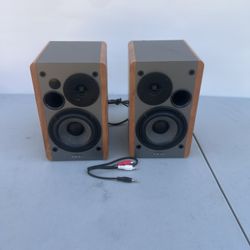 Edifier R1280DB Powered Bluetooth Bookshelf Speakers Pair Wood Read For Blemish. Used in good condition with some cosmetic blemishes. These blemishes 