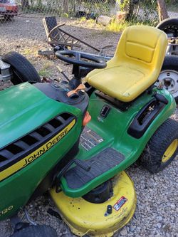John Deer riding lawnmower